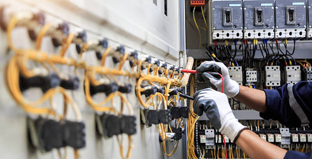 Professional Electrician technician working in Hancock, MI